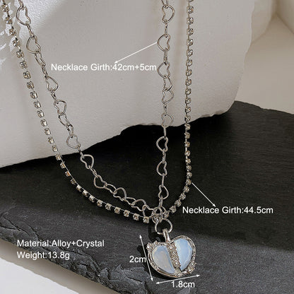 Collar de circonitas microincrustadas con corazón dividido 
