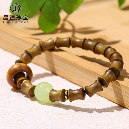 Green sandalwood bamboo bead bracelet.