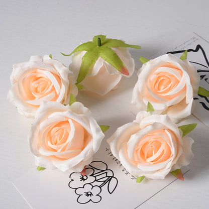 Artificial rose flower head