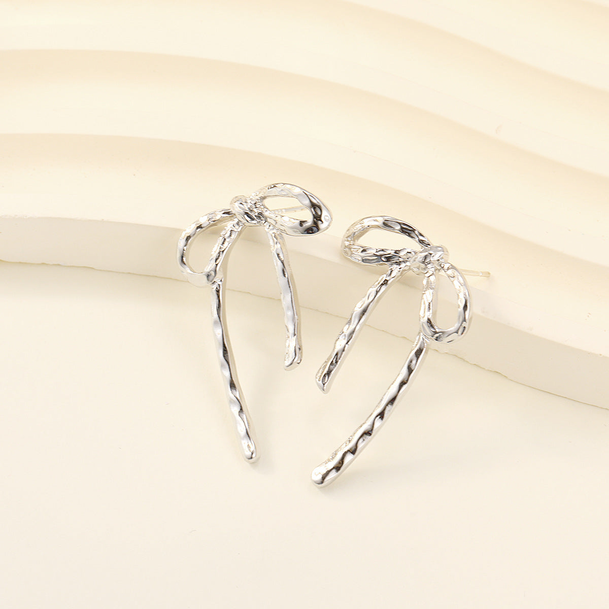 Irregular Metal Bow Stud Earrings
