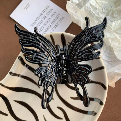 Pinza de agarre con forma de mariposa tridimensional 