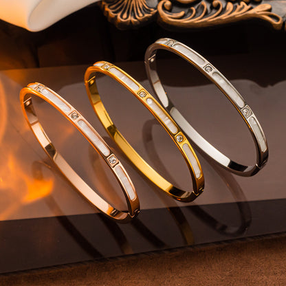 Pulsera de acero inoxidable en oro rosa con diamantes y concha, sencilla y versátil 