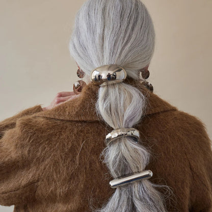 Accesorios para el cabello de acero de titanio. 