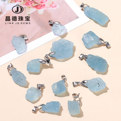 Aquamarine irregular rough stone pendant.