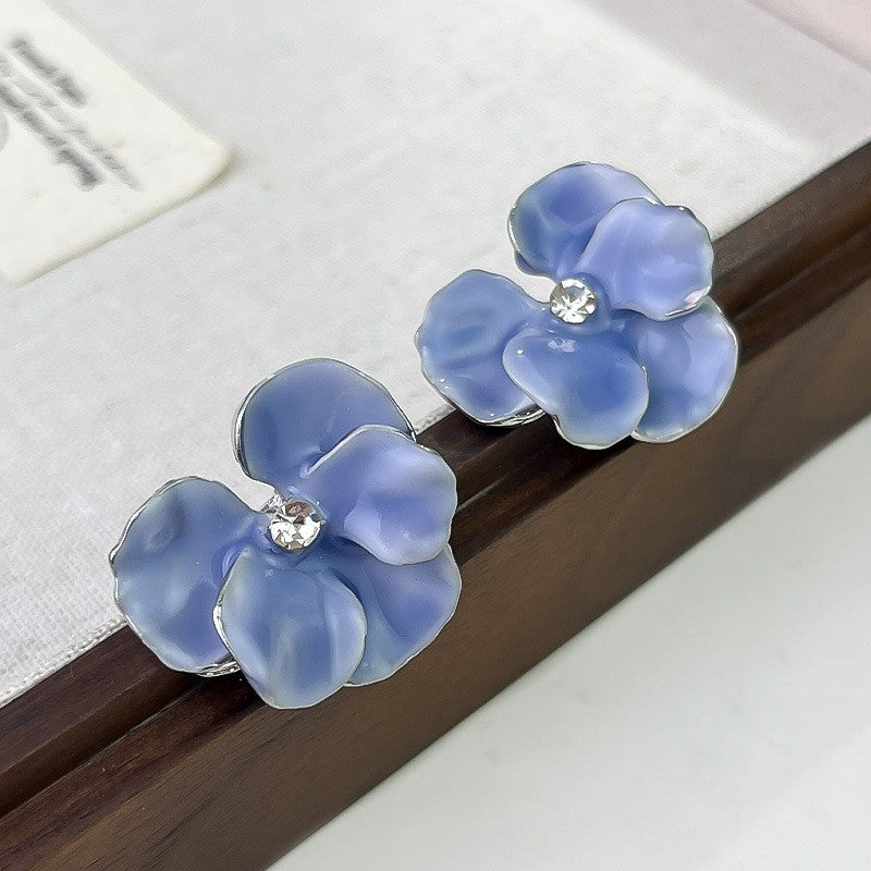 Pendientes tridimensionales de phalaenopsis con pétalos que gotean aceite en primavera y otoño 