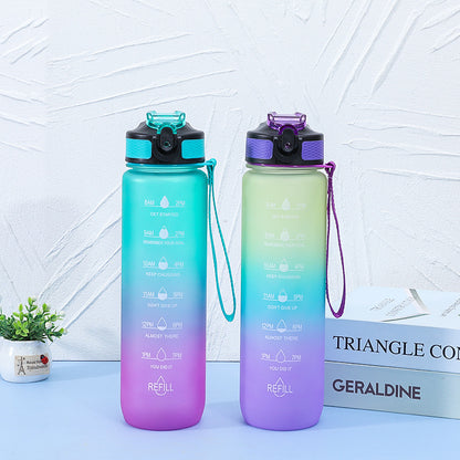 Botella de agua de plástico esmerilado con mango portátil 