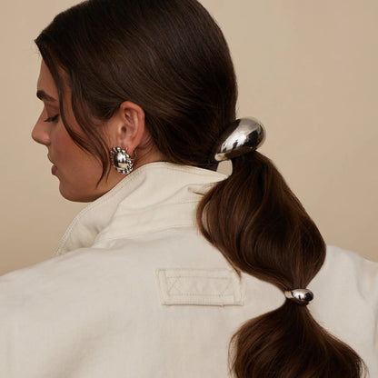Accesorios para el cabello de acero de titanio. 