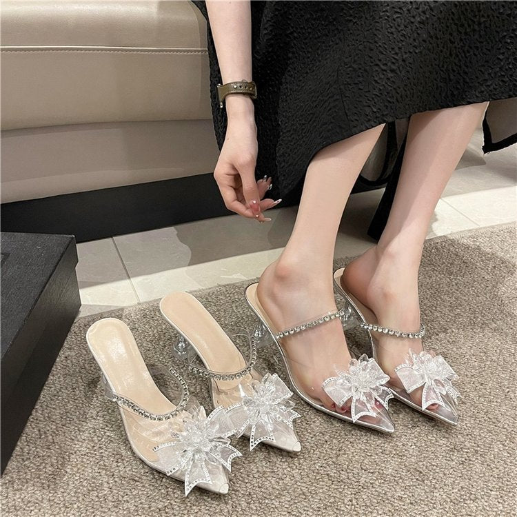Stiletto slippers with high heels