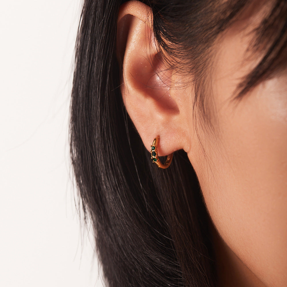 Three white diamond round earrings