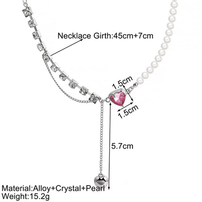 Collar de perlas con borlas en forma de corazón 