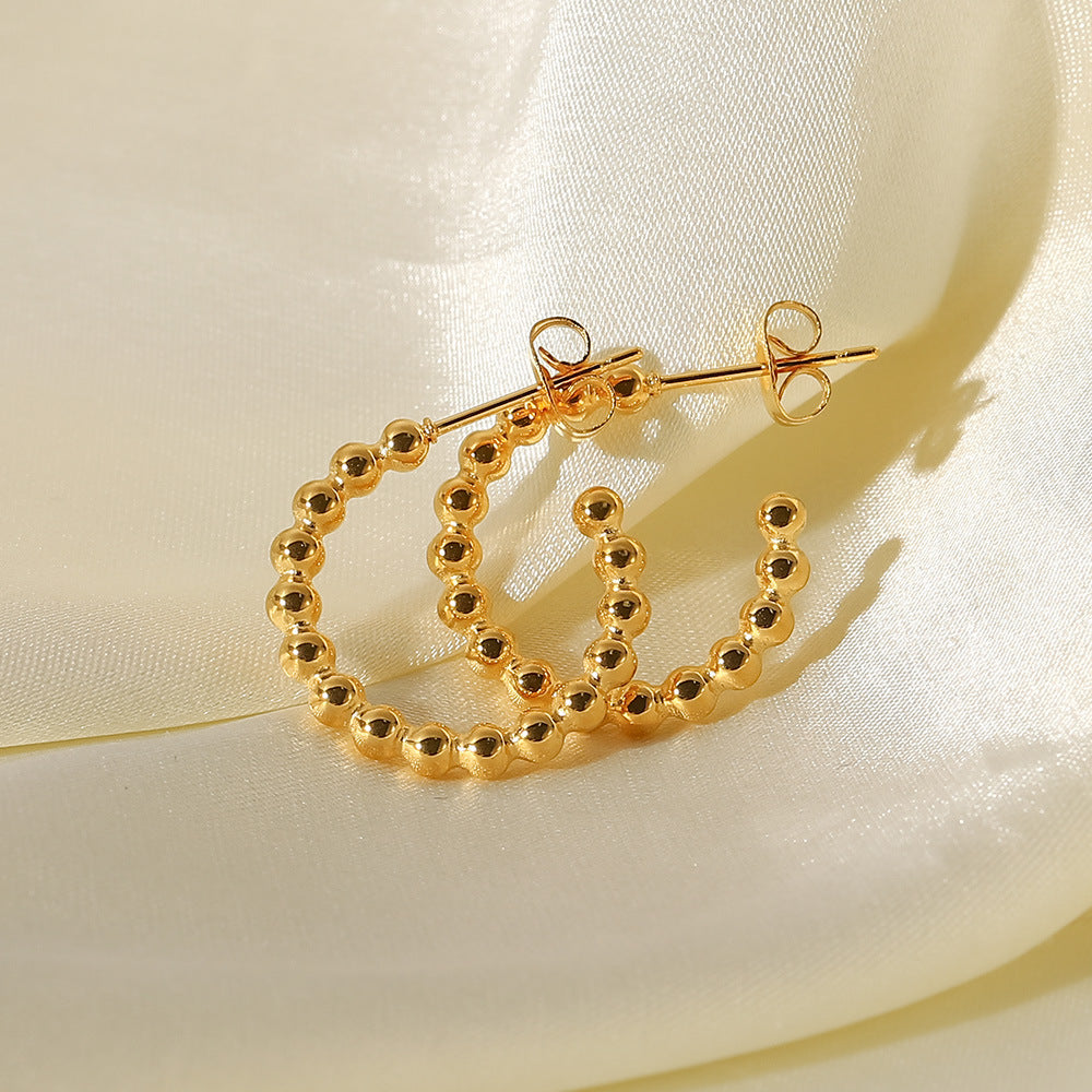 Gold round bead C-shaped earrings