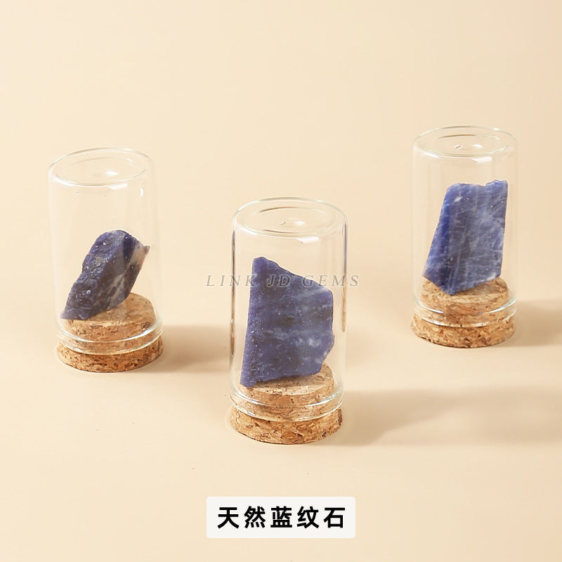 Botella de los deseos con muestra de mineral de roca de cristal 