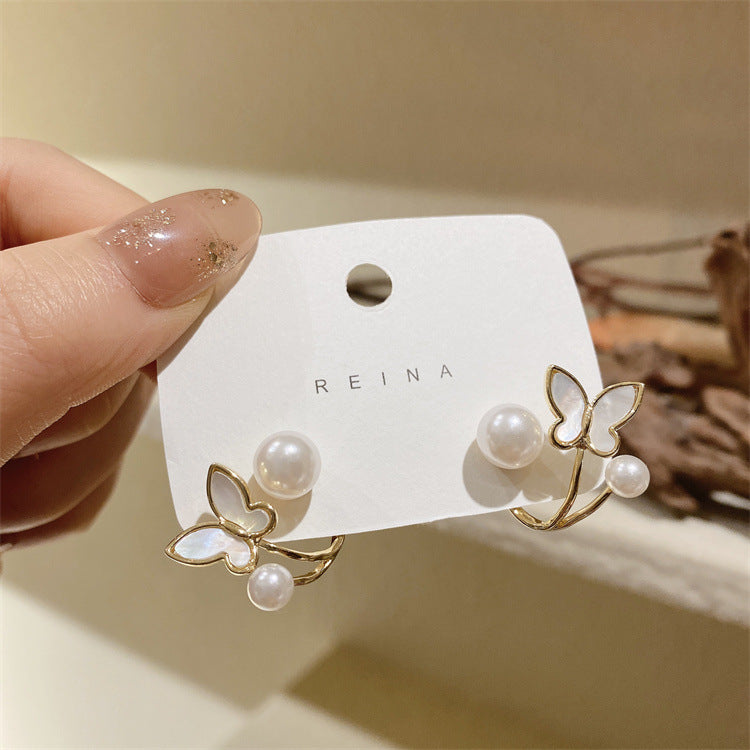 Butterfly pearl earrings are removable and multi-wear.