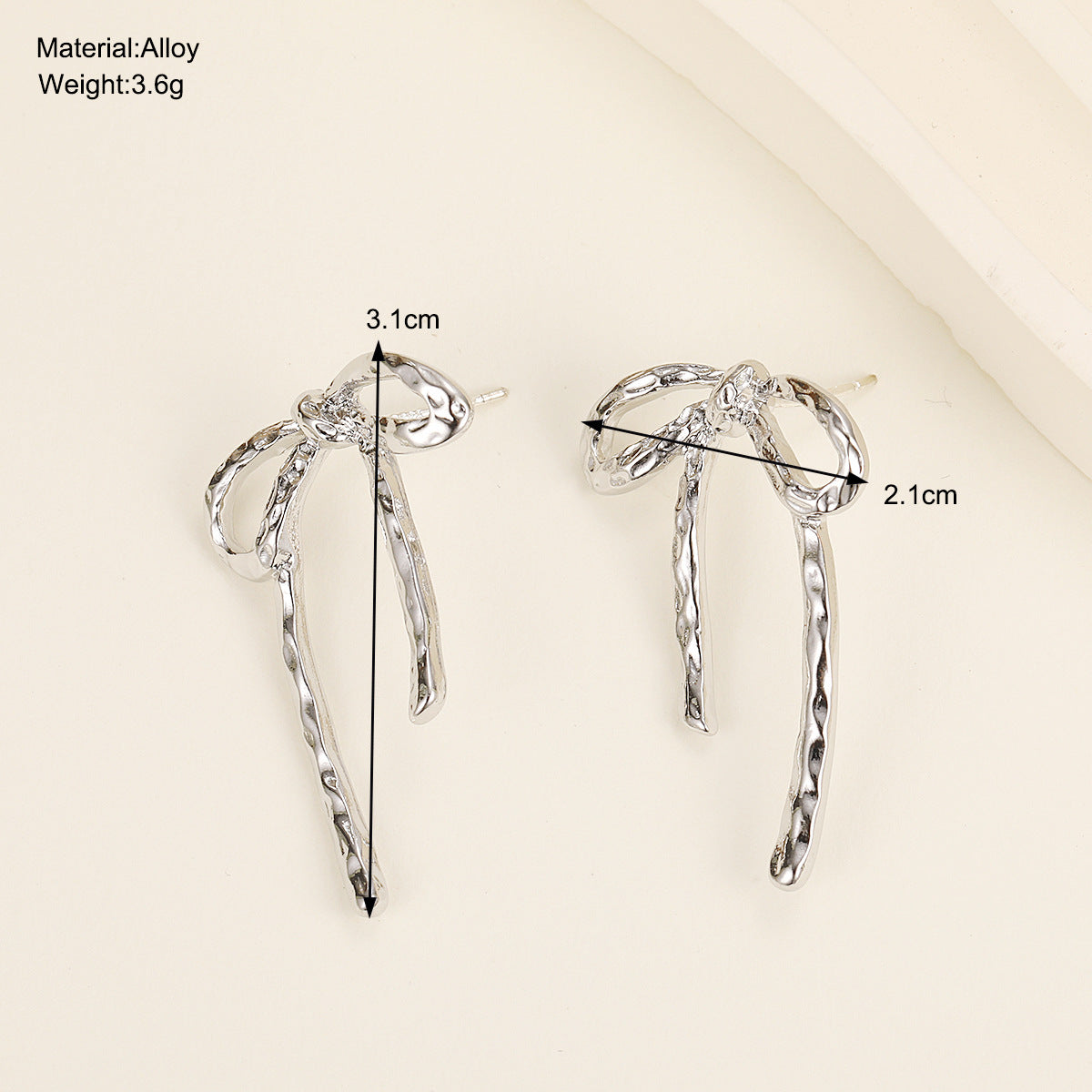 Irregular Metal Bow Stud Earrings
