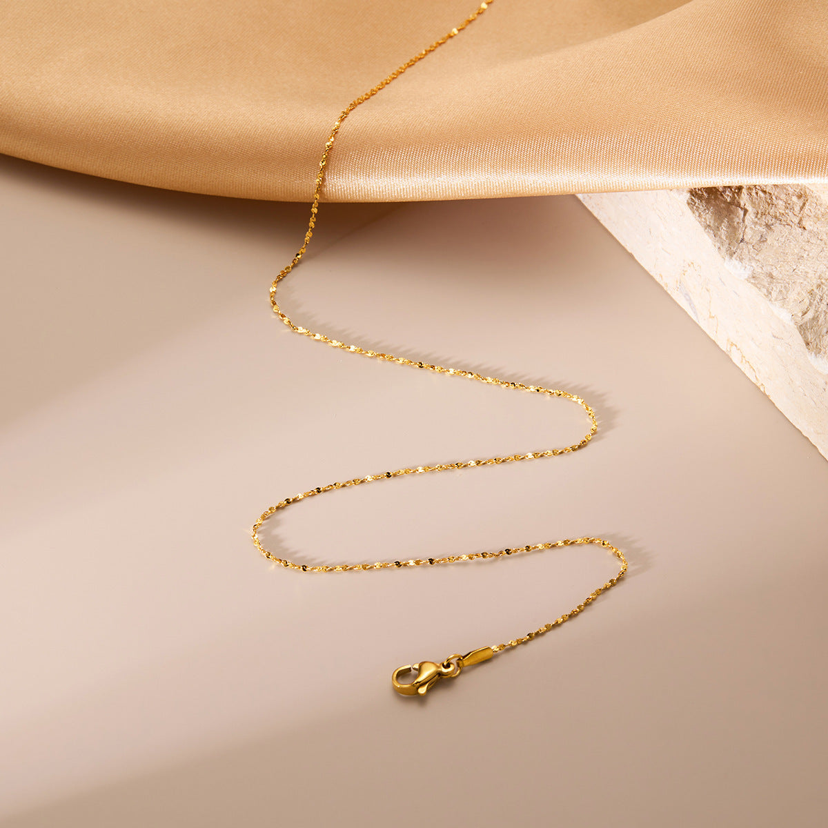 18K gold titanium steel gypsy necklace