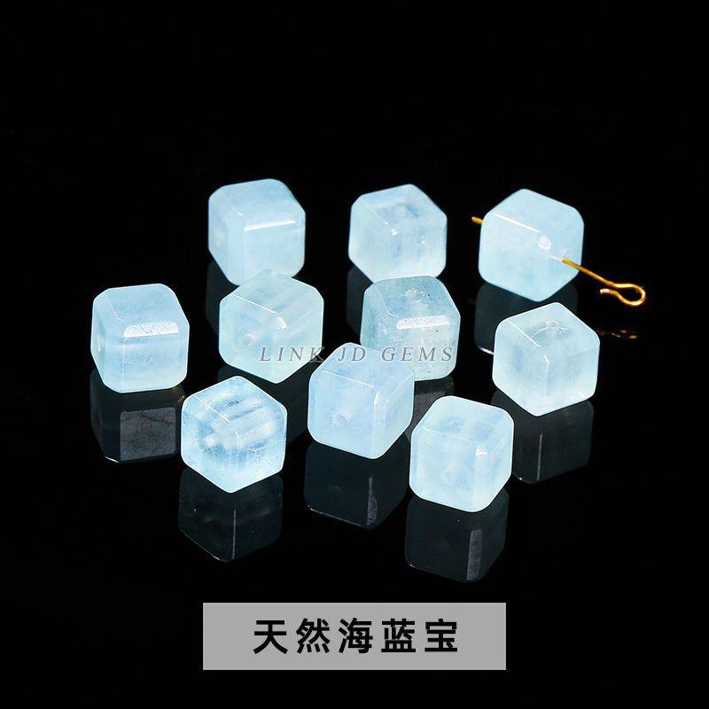 Aquamarine engraved rose inlaid with loose beads