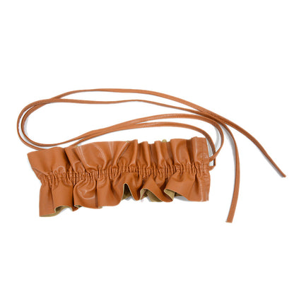 Elastic pleated edge belt