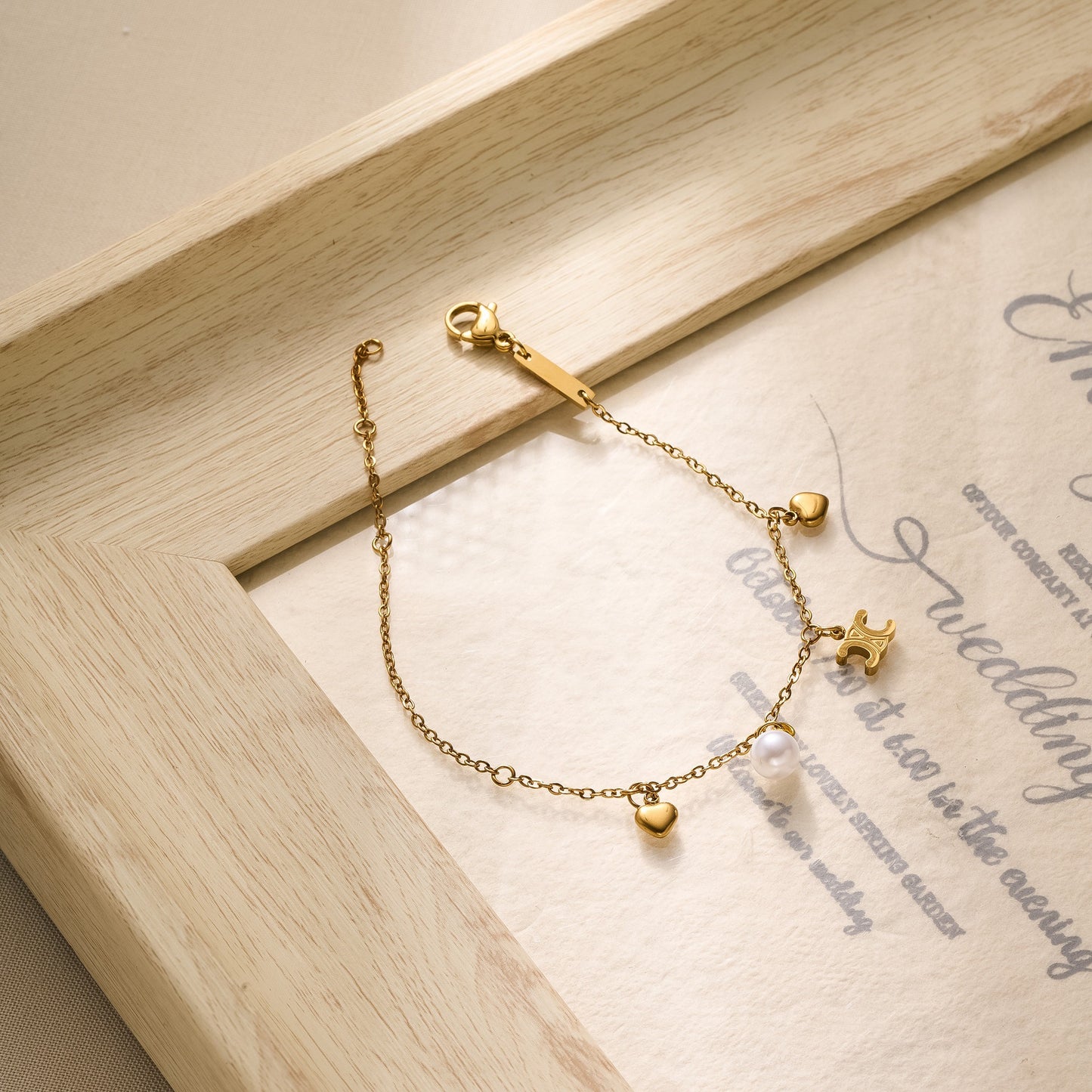 18K Gold Pearl Heart Bracelet
