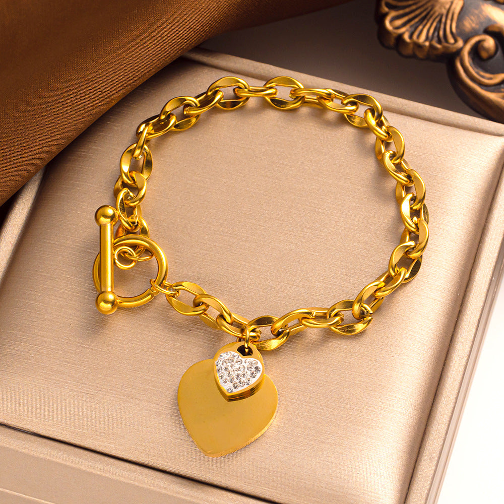Pulseira Simple Heart Titanium em ouro 18k com fecho em T 
