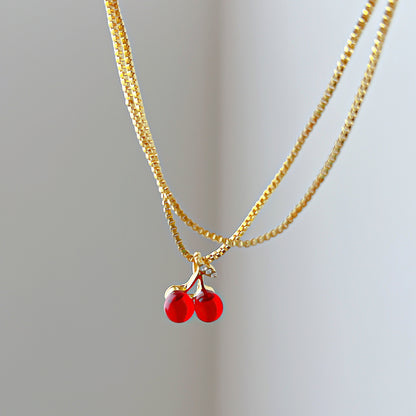 Collar con colgante de cereza roja 