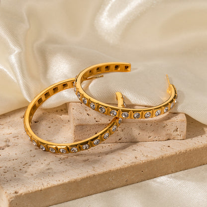 C-shaped exaggerated full pearl earrings