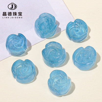 Aquamarine engraved rose inlaid with loose beads