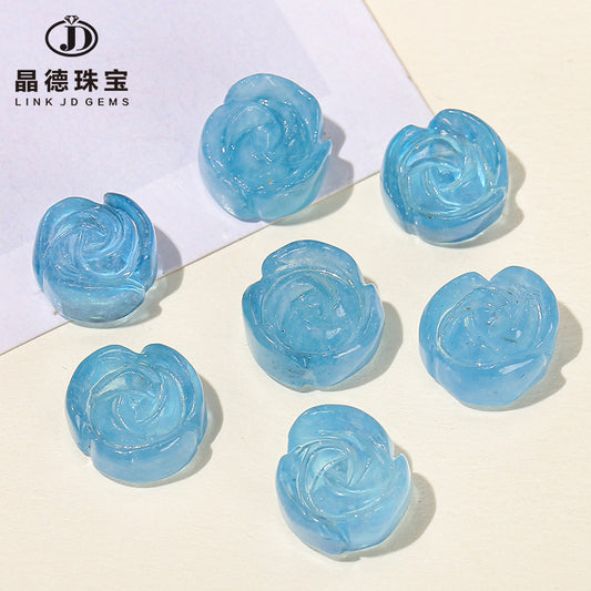 Aquamarine engraved rose inlaid with loose beads