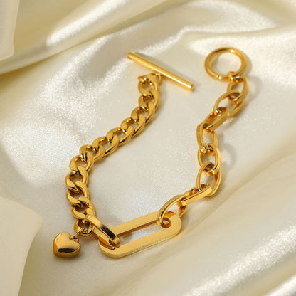 Pulsera con hebilla OT y colgante de corazón pequeño 