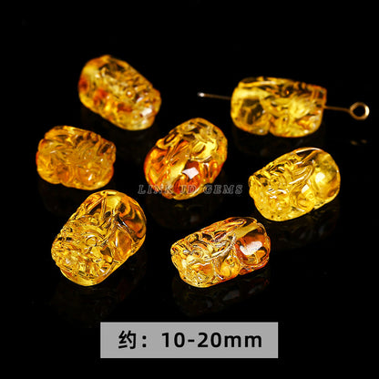 8 * 12 Natural Amber Beeswax Pixiu Through Hole Loose Beads