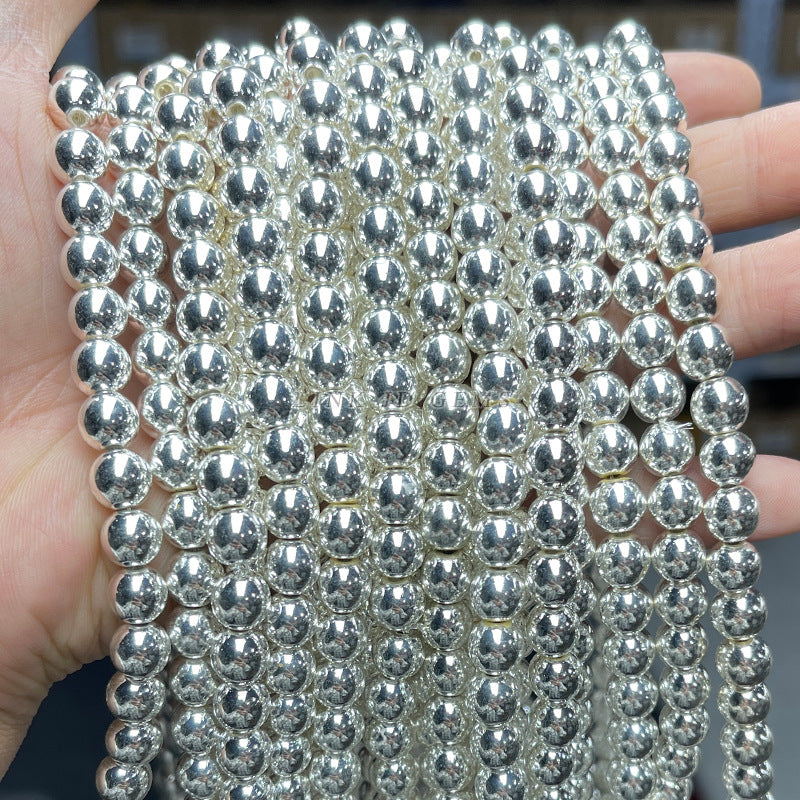 Perlas de plata y negro para cálculos biliares 