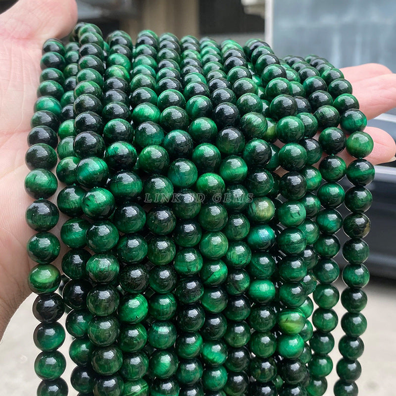 A grade green tiger's eye stone loose bead round bead bracelet.
