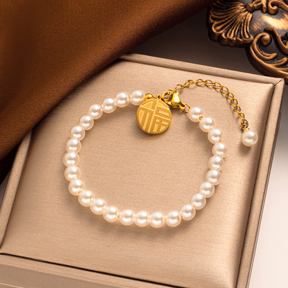 Pearl Bracelet for Women with Lucky Charm and 18k Gold Beads