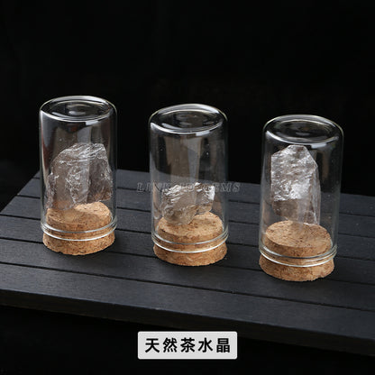 Botella de los deseos con muestra de mineral de roca de cristal 