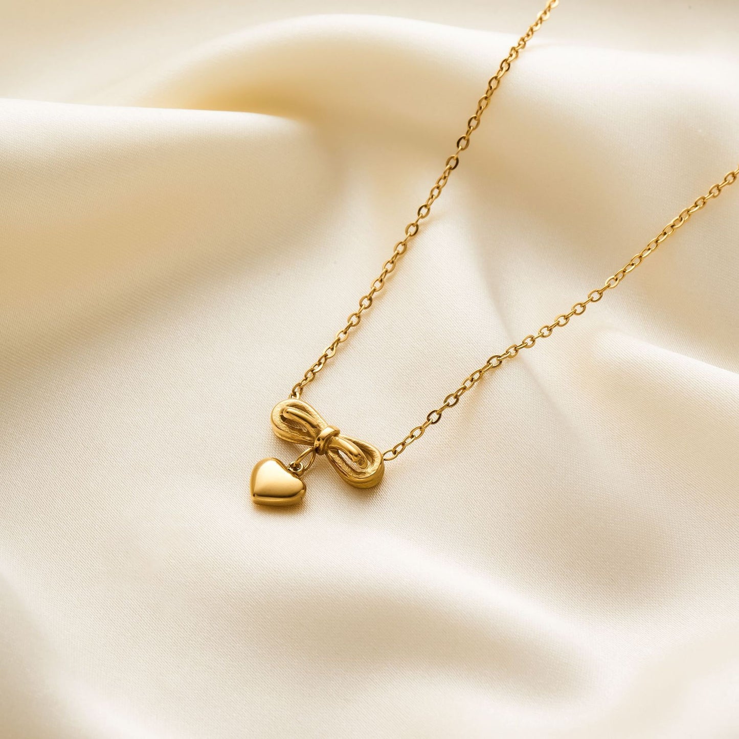 Titanium Steel Bow Love Necklace Set