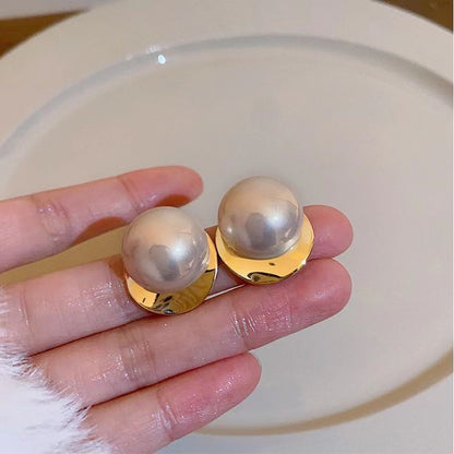 Big pink pearl stud earrings
