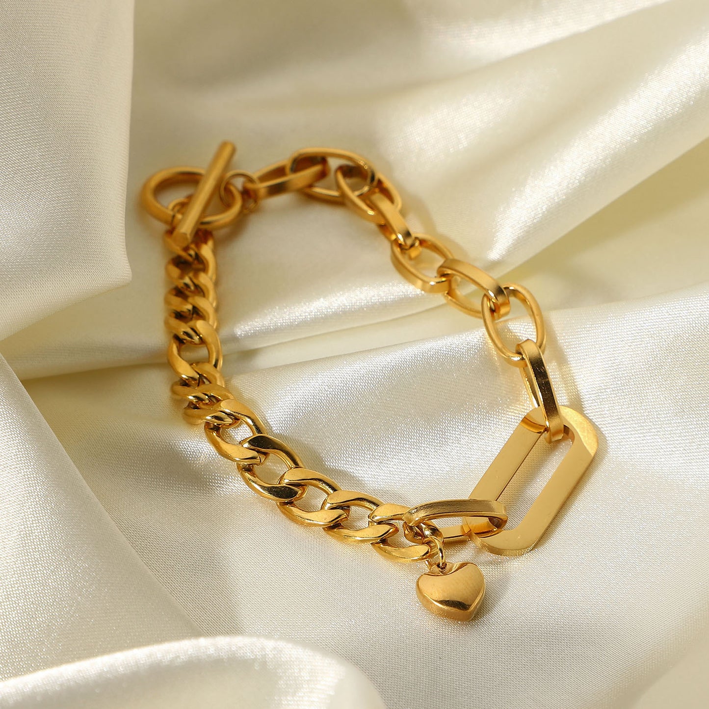Pulsera con hebilla OT y colgante de corazón pequeño 