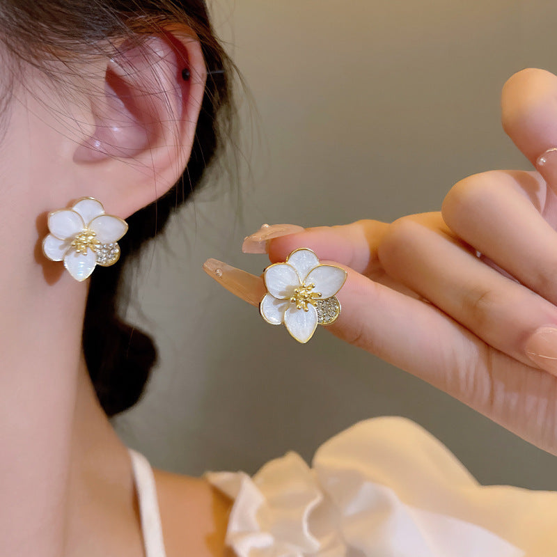 White petal earrings