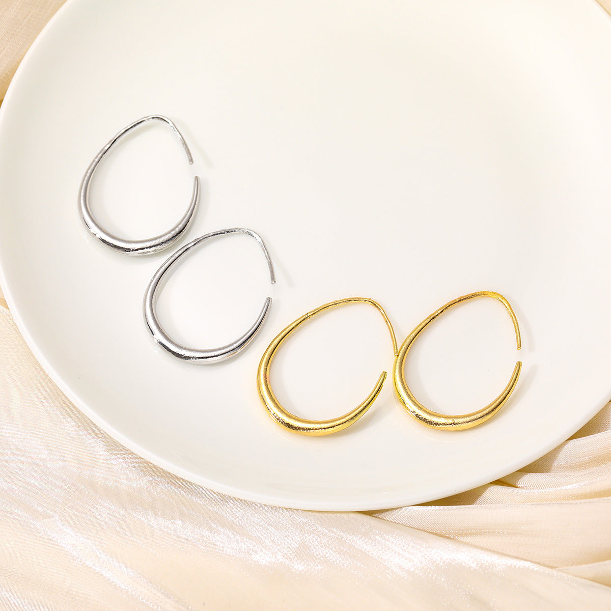 Oval Elongated Face Stud Earrings