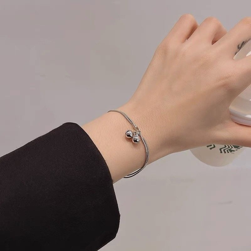 Double bell bracelet