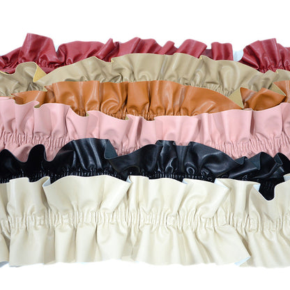 Elastic pleated edge belt