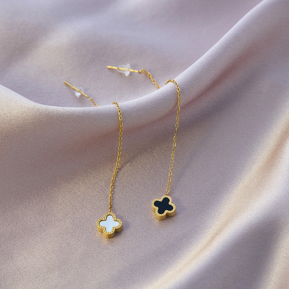 Four-leaf clover titanium steel ear buckle