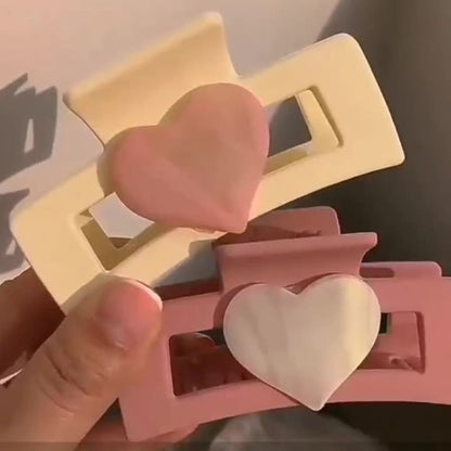 Garra de corazón rosa 