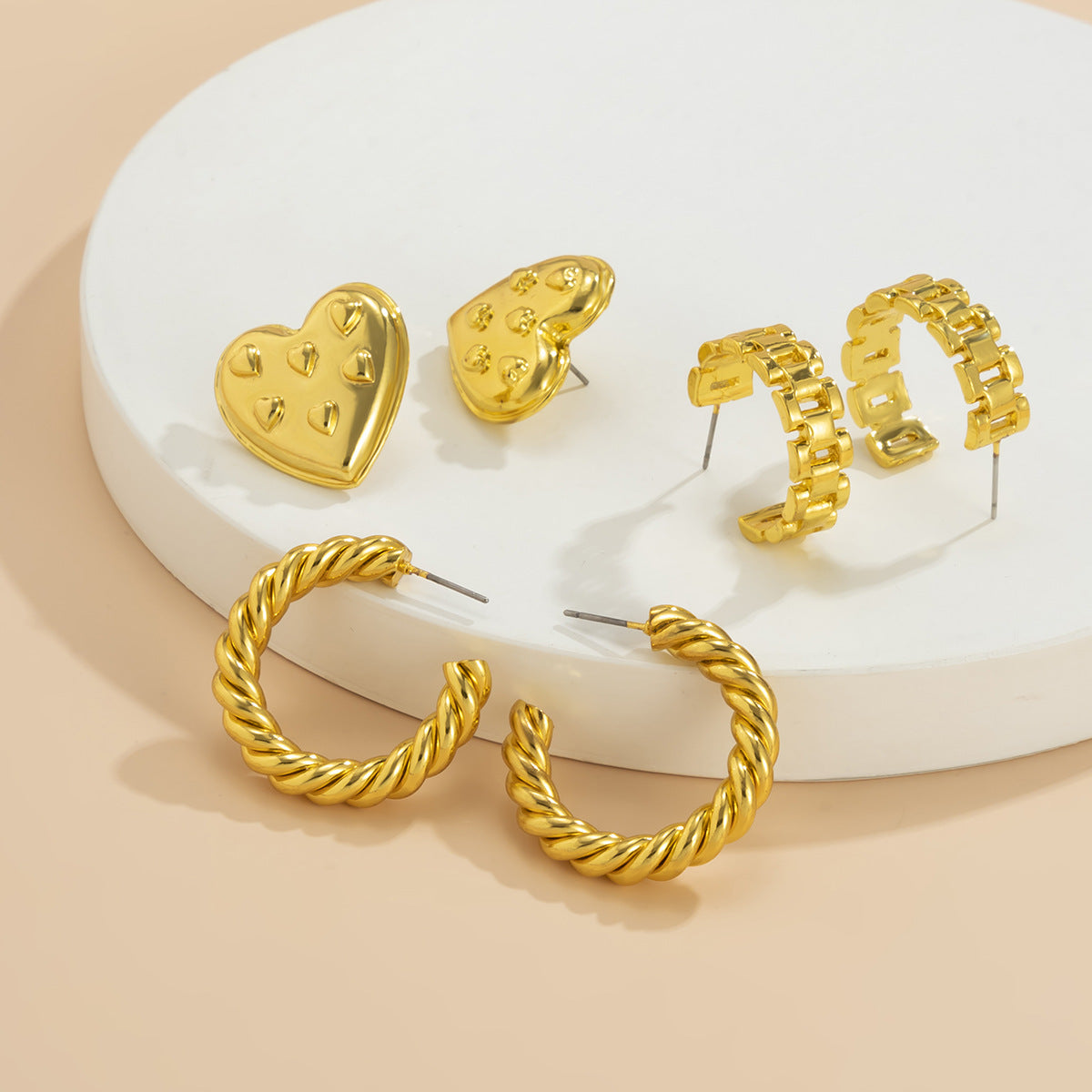 Pendientes vintage con forma de botón 