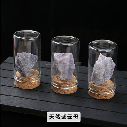 Botella de los deseos con muestra de mineral de roca de cristal 