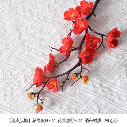 Burgundy themed artificial flowers