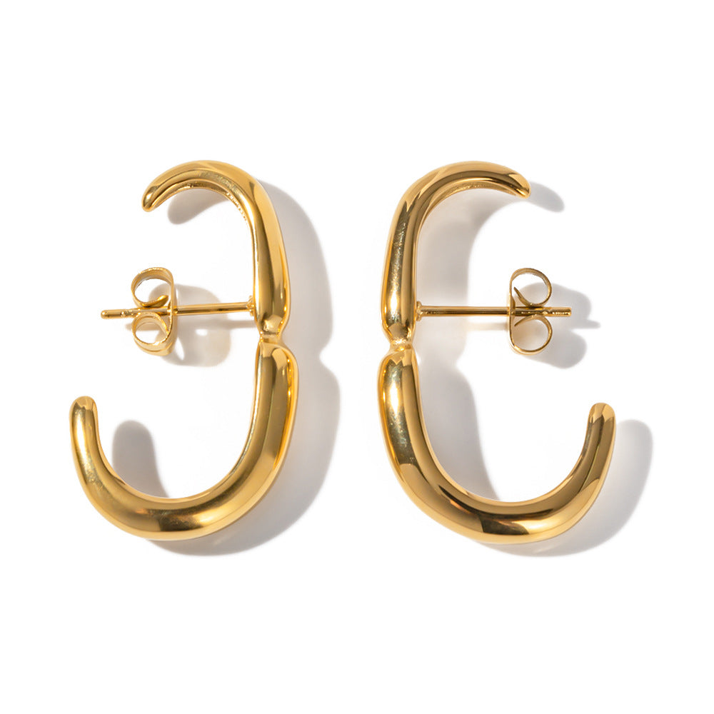 Geometric three-dimensional curve earrings