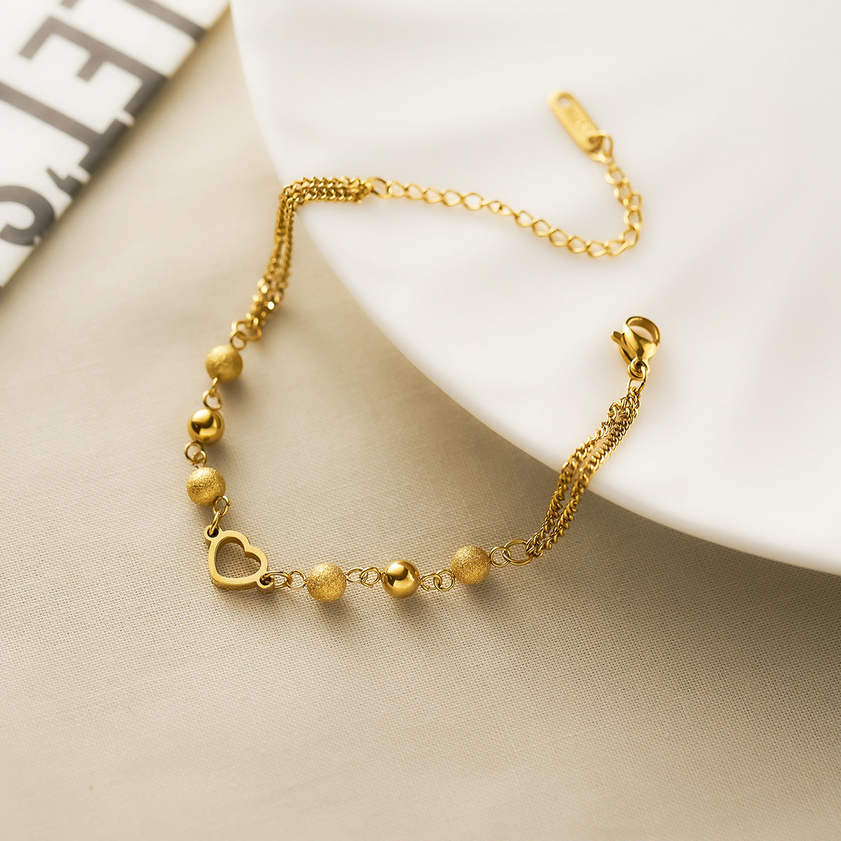 Women's Hollow Love Titanium Steel Bracelet — 18K Gold-Plated Matte Bead