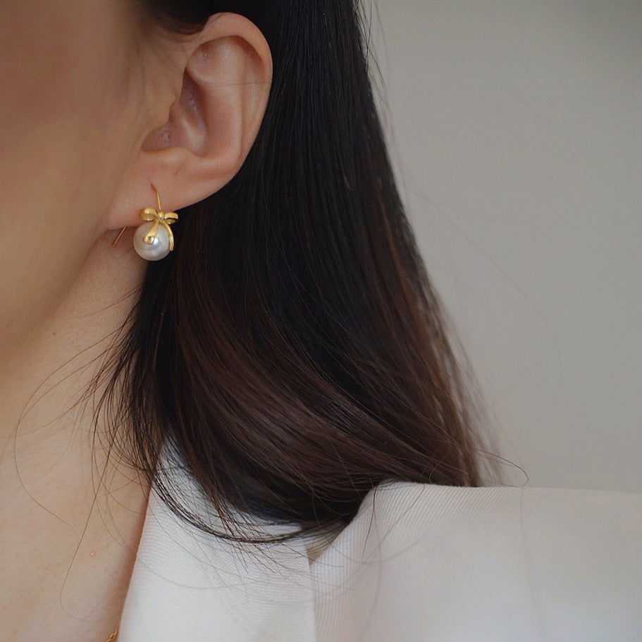 Pearl bow ribbon earrings