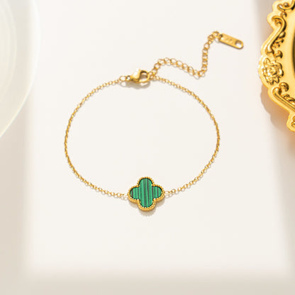 Pulseira feminina em aço titânio - trevo preto e branco, corrente em ouro rosa 