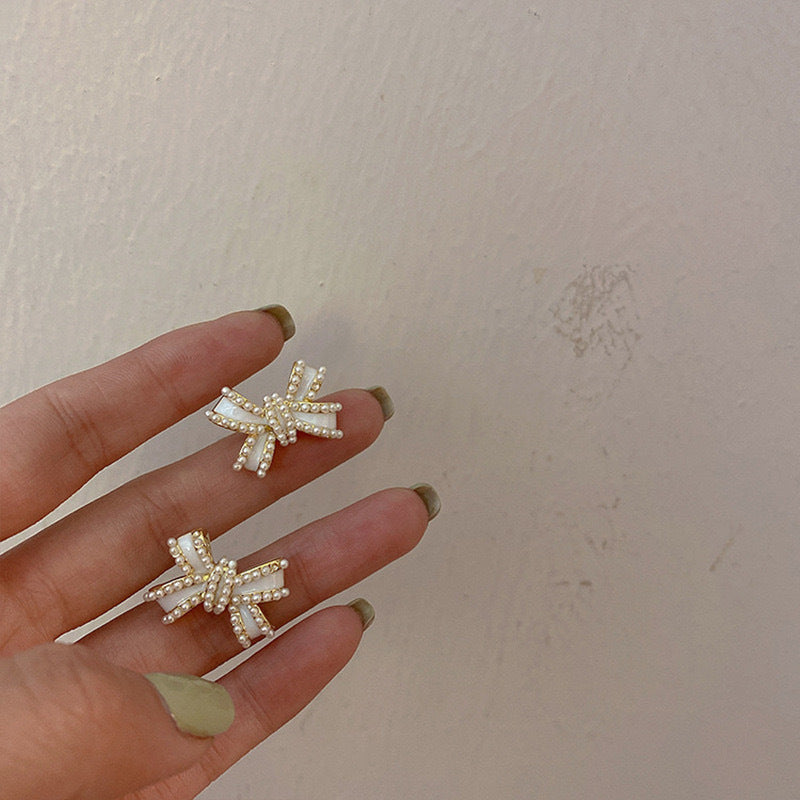 Pendientes con flecos de perlas y lazo de aguja de plata S925